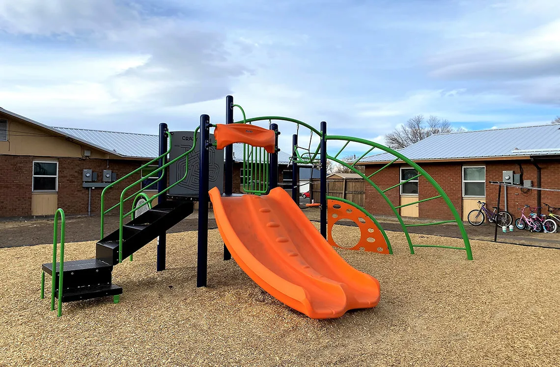 Double plastic slide at Alamosa Housing Authority